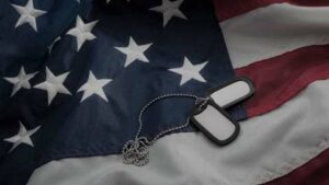 American flag with dog tags