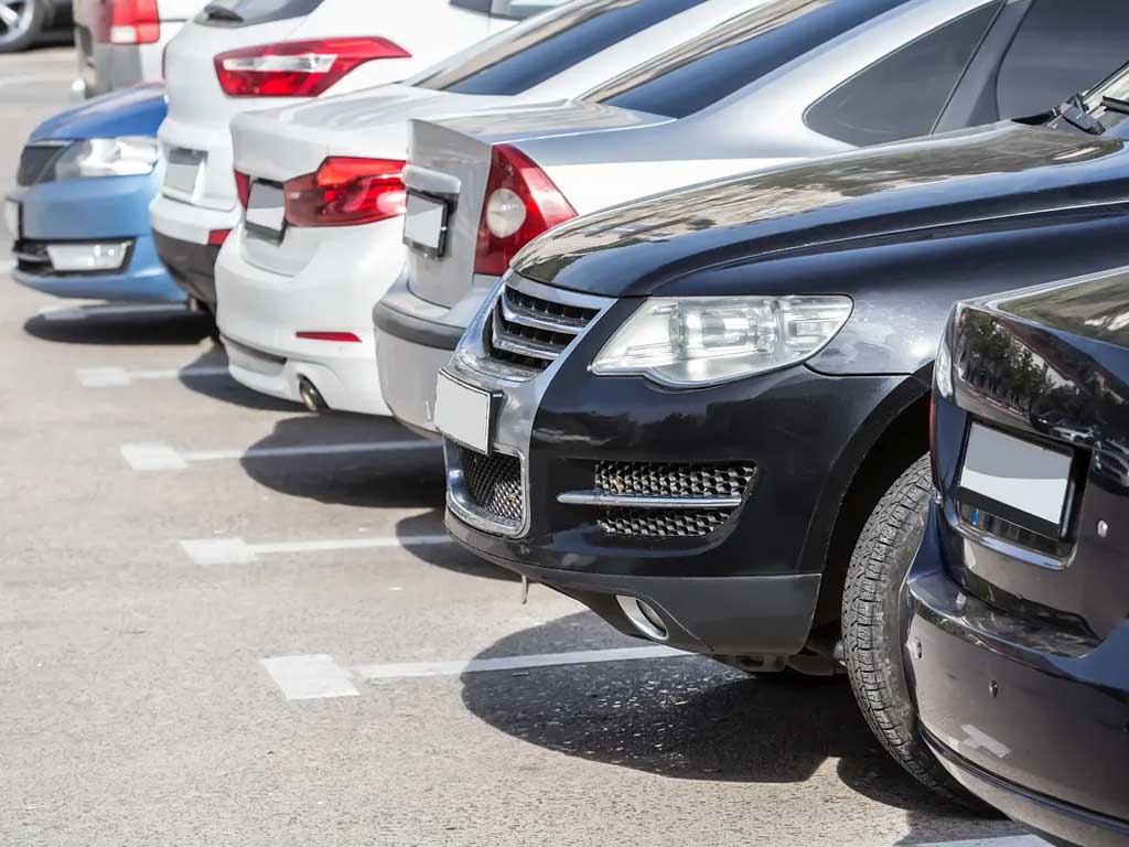 Closeup of cars parked in a lot