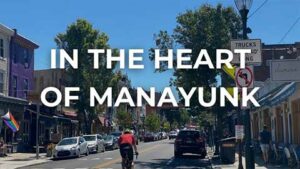 Downtown Manayunk with the words in the heart of Manayunk overlaying the photo